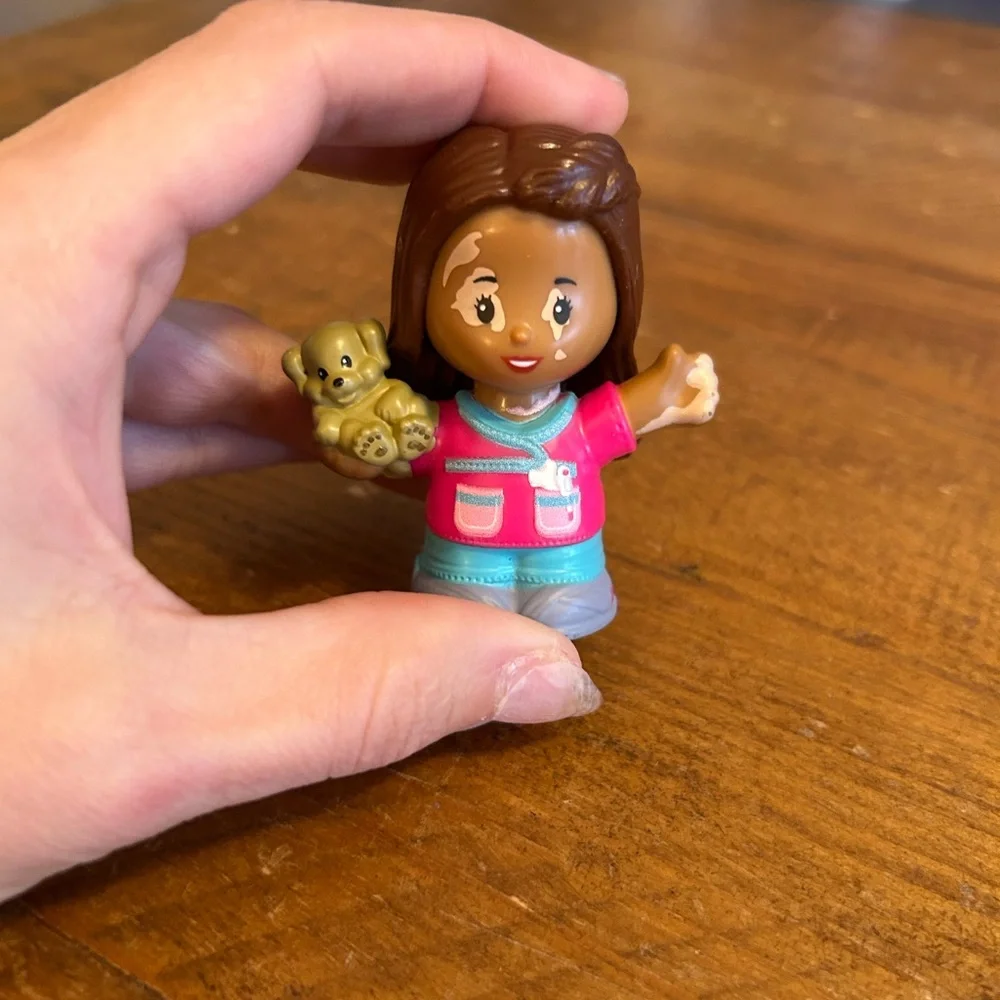 Fisher Price Little People Barbie’s friend with melasma as is